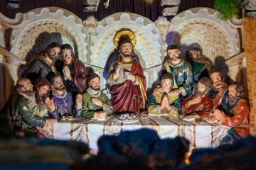 Sculpture on plaster dolls representing Jesus at the table and the apostles at the last supper. Heralds of the Gospel Monastery, Ponta Grossa City, Parana State, Brazil. 12-27-2013