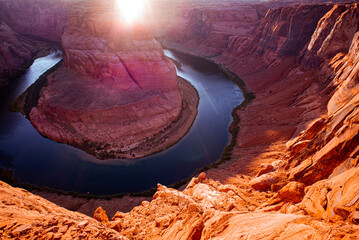 Beautiful landscape of Horseshoe Bend with sunrise and reflecting surface of Colorado River near...