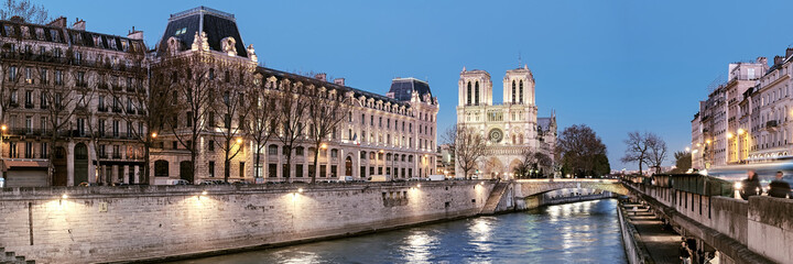 Eveing panorama of illuminated Paris and river Seine