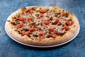 pizza on the wooden background