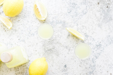 Italian traditional liqueur limoncello with thyme