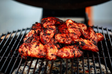 Chicken wing platter with sriracha sauce and fresh chillis