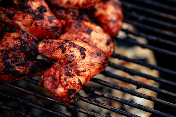 Chicken wing platter with sriracha sauce and fresh chillis