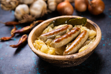 Grilled german sausage links with sauerkraut