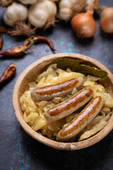 Grilled german sausage links with sauerkraut