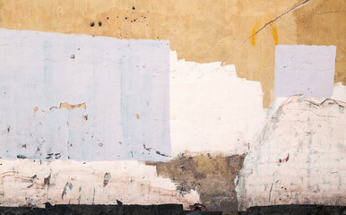 Old concrete wall with paint layers