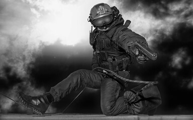 Special forces soldier storms the building. Hostage release concept. SWAT.