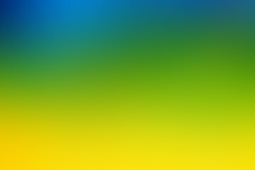 Abstract blurred background of yellow, blue and green colors