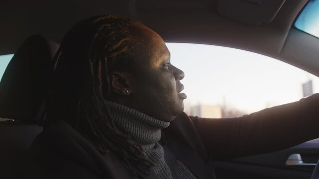 Portrait of african american black man driver in cauth in the traffic jam. High quality 4k footage