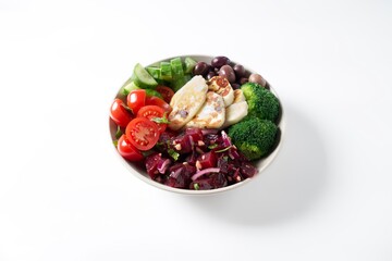 Bowl with Halloumi cheese, fresh cucumbers, tomato, olives, broccoli and beets