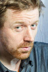 Whte man under  face with beard