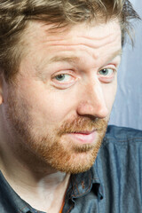 Whte man under  face with beard