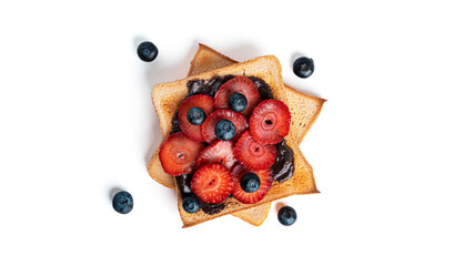 Naklejka na ściany i meble Toast bread with chocolate spread and berries isolated on a white background