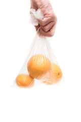 a man is carrying fresh fruit