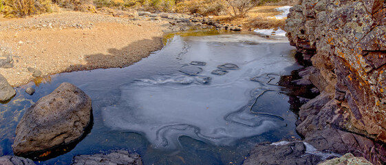Frozen Basalt Pond In Devil Dog Canyon near Drake Arizona.