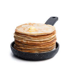 Stack of thin pancakes in small frying pan isolated on white