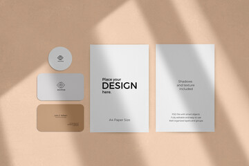 Corporate stationary set mockup with window shadow effect on a beige background