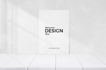Blank sheet editable template in front of texture wall