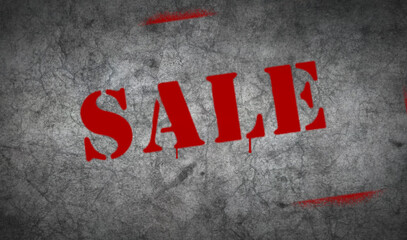 Sale sign spray painted on the concrete wall