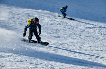 Extreme snowboarding and winter sports. Breckenridge, Colorado at Emperial bowl area at sunny day.