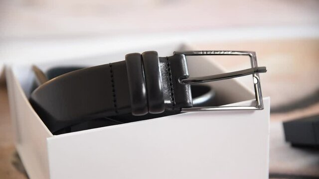 Black leather belt with silver buckle for men 