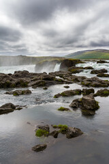 Detail of the majestic Godafoss waterfall near the city of Akureyri during summer season