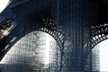 The arch of the Eiffel during painting operations which take place every 7 years. Paris, France, the 29th march 2021.