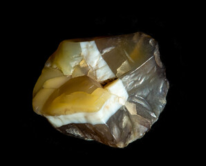 Raw agate quartz minerals nugget from Novy Urengoy, Russia. A backlight photo of stone isolated on...