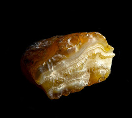 Raw agate quartz minerals nugget from Novy Urengoy, Russia. A backlight photo of stone isolated on...