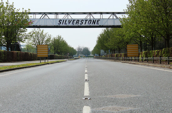 Silverstone, Northamptonshire / UK - April 22, 2019 - Silverstone sign on pedestrian walkway above the road.