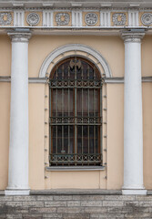 Windows in the city in the old style, with stucco, decorative elements