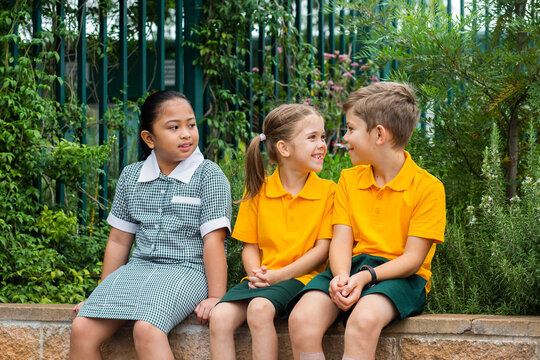 happy primary school children outside