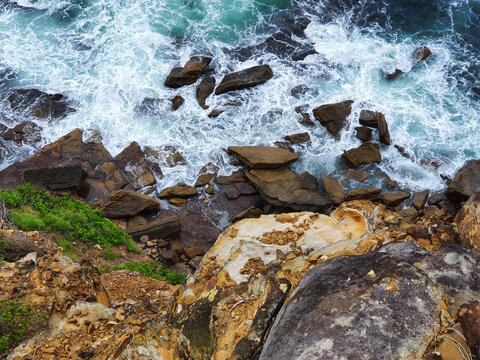 Waves crashing on rocks