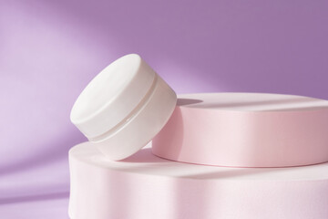 Beauty cosmetic cream jar mockup on purple podium showcase. White package container on pedestal,...