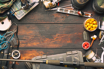 Fishing accessories. Frame with fishing boxes, reels, fishing floats, rod, compass, feeder, knife,...
