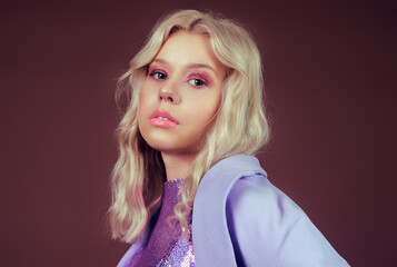 A girl in a purple jacket on a brown background in 70s, 80s, 90s style makeup, long silver...