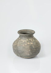 Ancient Clay Vessel with Weathered Surface on Clean Studio Background