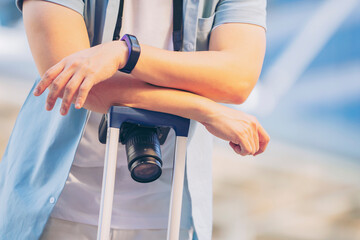 Couple Man Woman traveler with suitcase on businesses centre building  background
