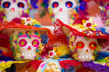 Female candy skulls with hats for the day of the dead in Mexico, Catrina