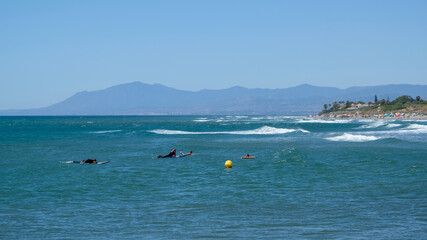 CABO PINO, ANDALUCIA/SPAIN - JULY 2 : People Surfing at Cabo Pino Andaluc&iacute;a Spain on July 2, 2017. Unidentified people.
