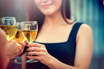 Party time start. Happy people toasting with champagne flutes. Multiethnic friends congratulating each other with new year. Celebration holiday concept, holiday background. selective focus