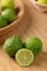 Fresh bergamot fruit on woven bamboo background, Food ingredients and extract used for medicine, tea, perfumes and cosmetics