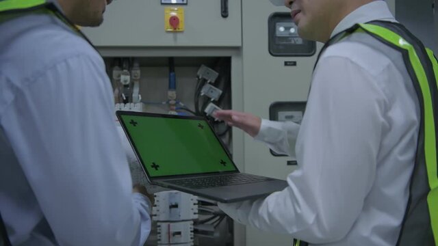 Engineer concept of 4k Resolution. Asian men are consulting using computers.