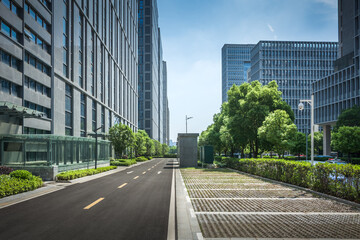 Asphalt road and modern city
