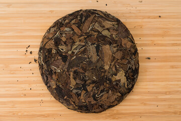 Compressed tea cake on white background