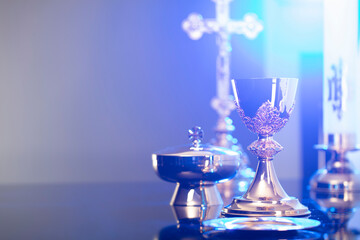 Religion theme – Easter. Catholic symbols composition. The Cross, monstrance  and golden chalice...