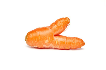 Fresh natural ugly raw carrot isolated on white background