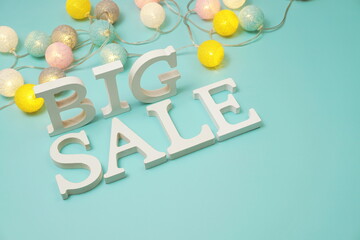Fototapeta premium Big Sale alphabet letters with LED cotton balls decoration on blue background