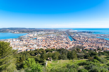 Fototapeta na wymiar Sète in France, aerial panorama, the harbor and the city with typical tiles roofs 