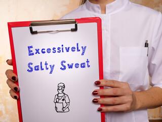 Healthcare concept about Excessively Salty Sweat with phrase on the piece of paper.